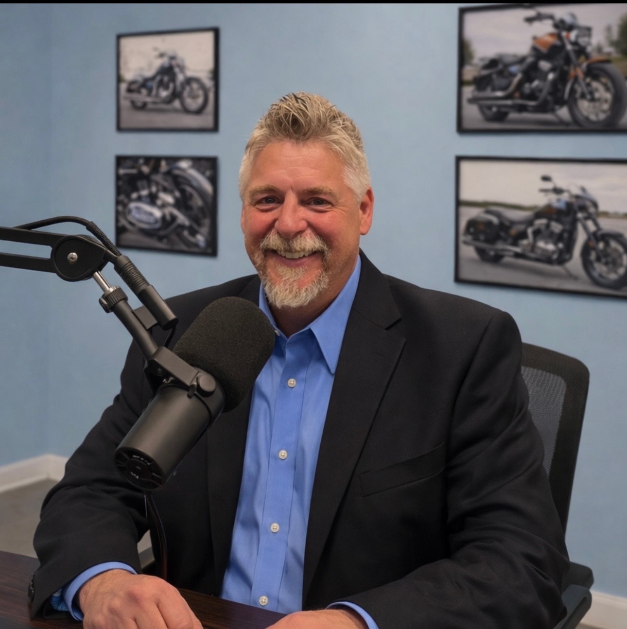 BCP podcast host at microphone in studio